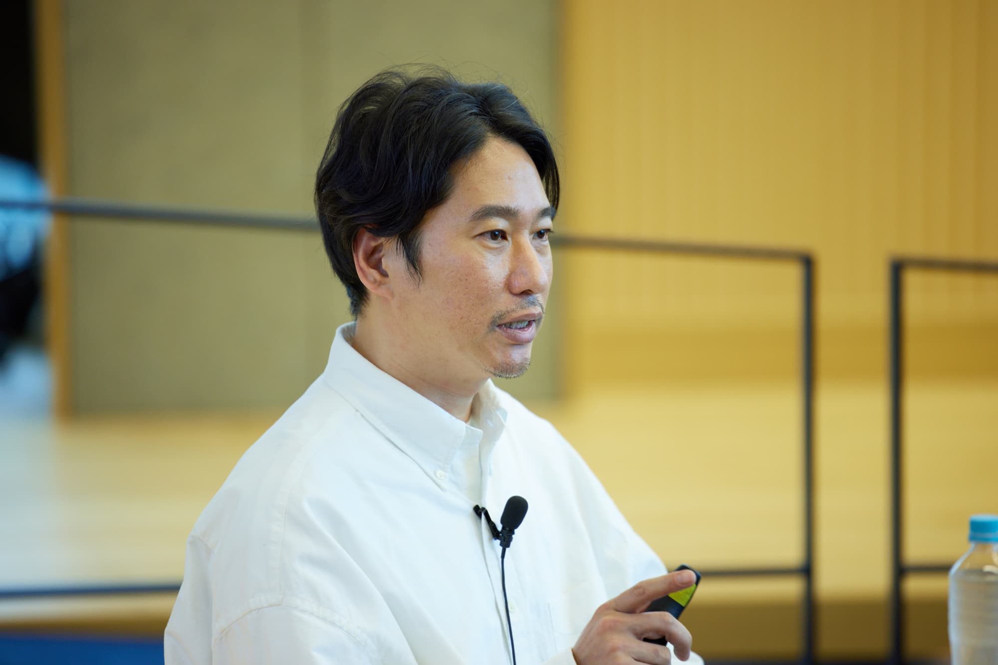 株式会社リクルート 執行役員(プロダクト本部 HR)山口順通が、2024年2月21日情報共有会「リクルートの人材領域におけるテクノロジー活用―『Indeed PLUS』参画と『レジュメ』導入を通じて実現したいこと」で語る様子
