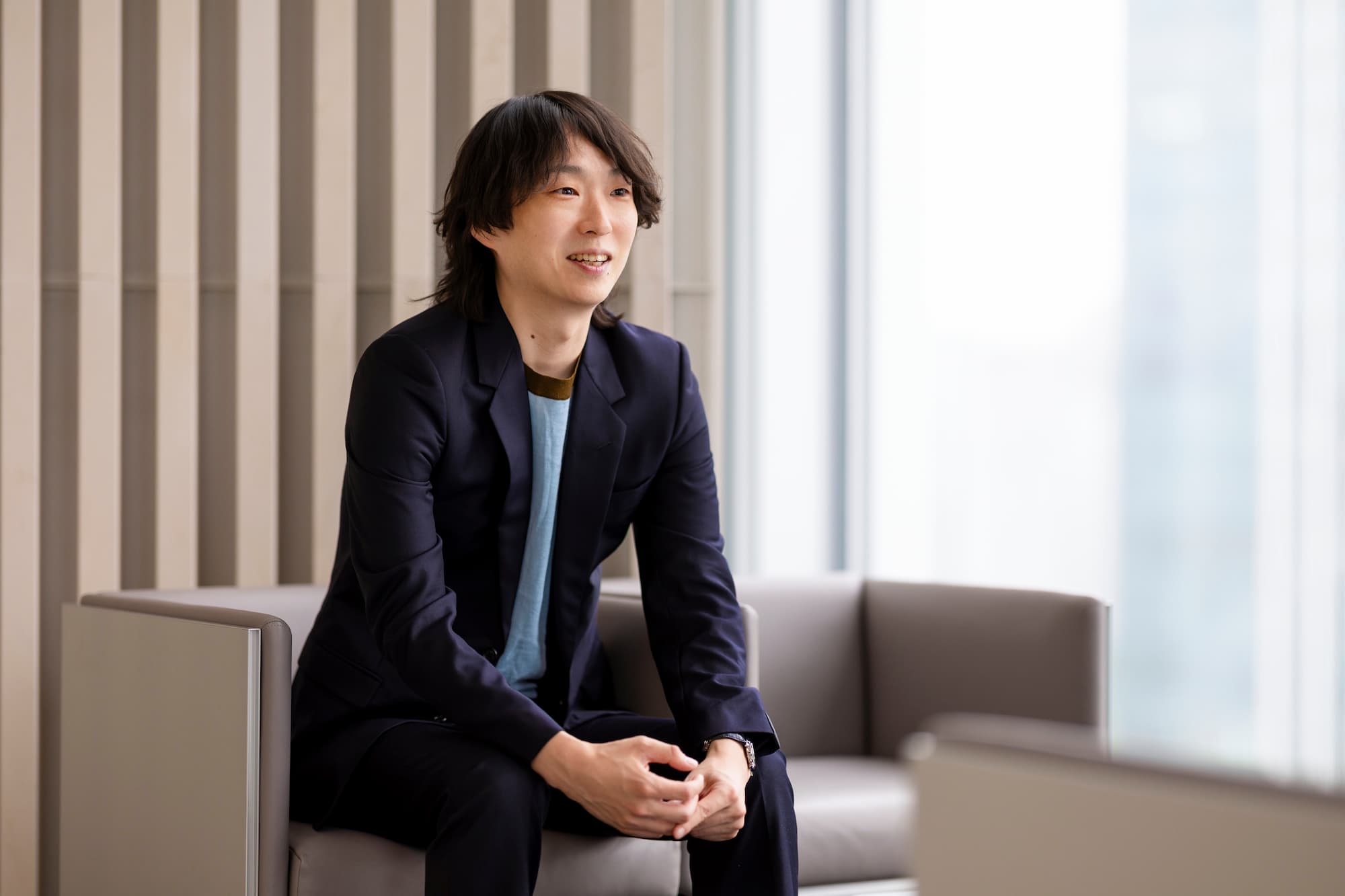 『エアウォレット クイックローン』の仕組みについて話す西脇源太